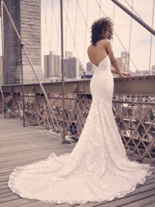 Maggie Sottero Grace.Sequined mermaid lace wedding gown with deep V-neck
