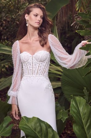 Maggie Sottero Doritte Pearl And Crepe Wedding Dress With Unique Lace Hip Dips And Illusion Corset Bodice
